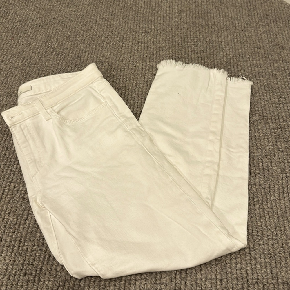Joe’s white denim. The Lara mid rise cigarette ankle.